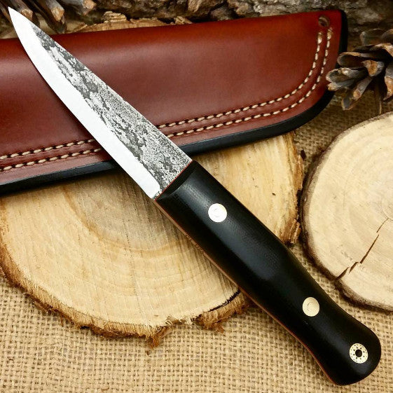 http://www.adventuresworn.com/cdn/shop/products/Black-Canvas-Micarta-woodcrafter-Bushcraft-Knife-01.jpg?v=1527638229