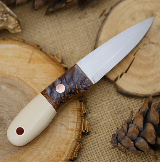 Walker: Ivory paper micarta & Cast Pine Cone