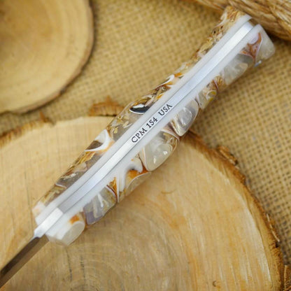 CPM 154 Mountaineer: Cast Seashells & White Acrylic - Adventure Sworn Bushcraft Co.